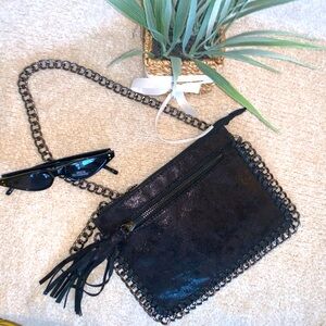 Faux suede material chain detailed crossbody bag